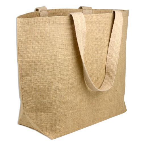 Machine embroidery of canvas shopping bags.