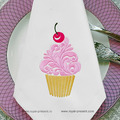 Ornamental cupcake with cherry
