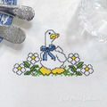 Goose in flowers Cross Stitch