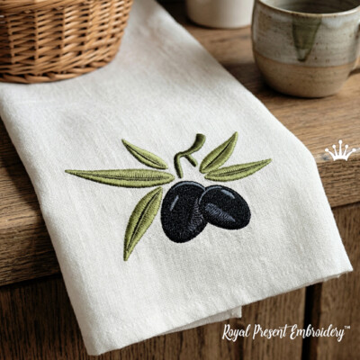 Mediterranean olive branch machine embroidery design stitched on a linen towel