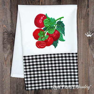 Red tomato machine embroidery design stitched on a kitchen towel