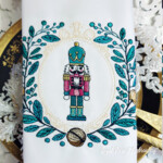 Nutcracker in a Baroque frame with fir branches - 4 sizes
